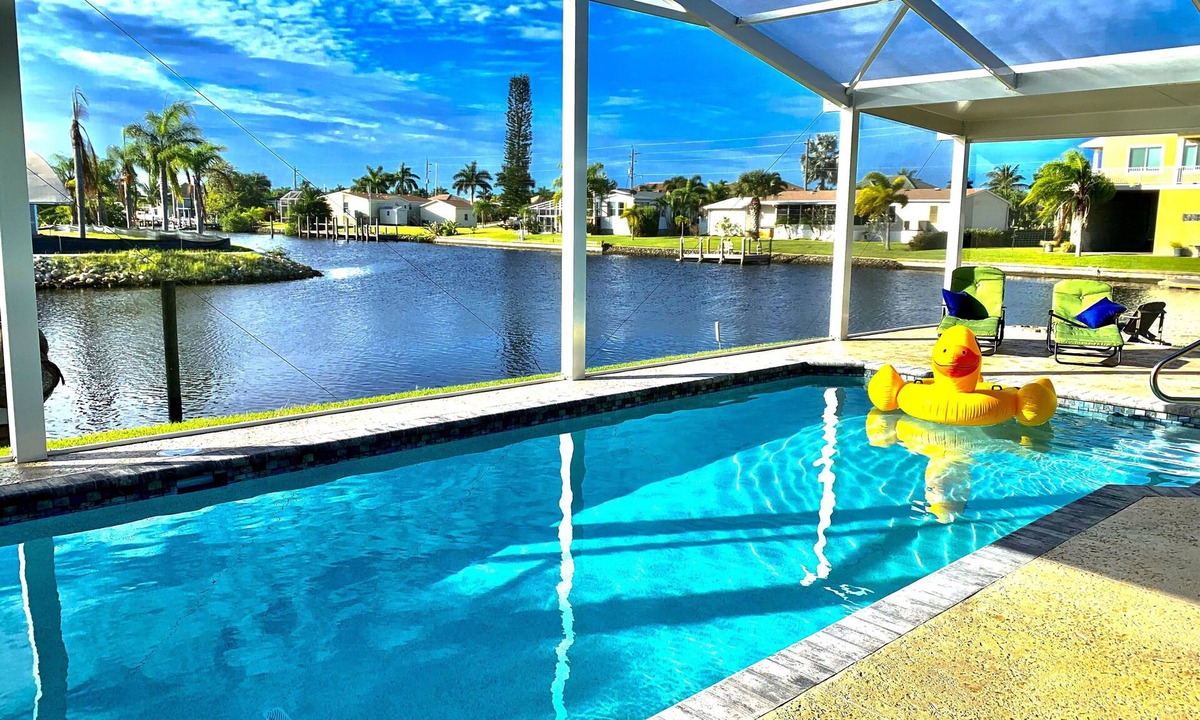 Charlotte Park House | Waterfront corner lot-Heated Private Pool. You will love it as much as we do ❤️