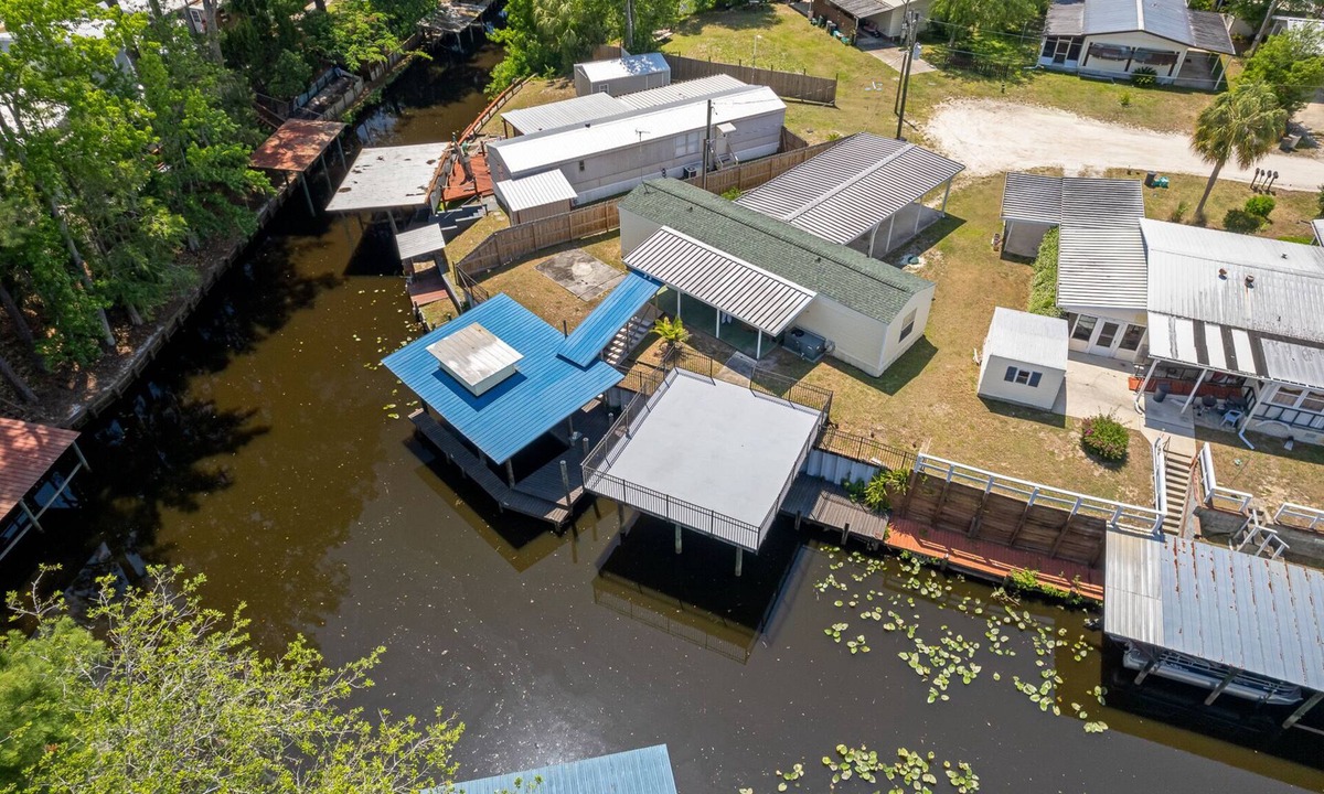 Satsuma House | Waterfront home in Satsuma. Two bedrooms each with full bath. Gas grill.