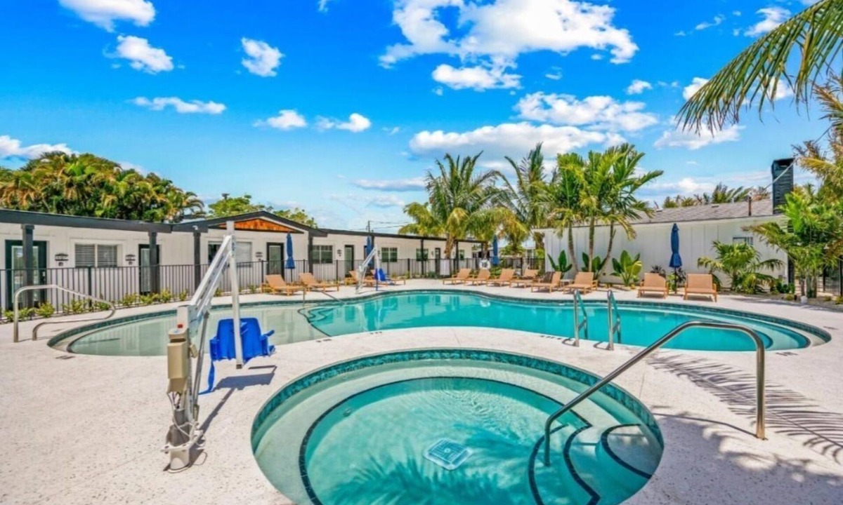 Whitney Beach House | Waterview bedroom, great location steps from Bridge Street