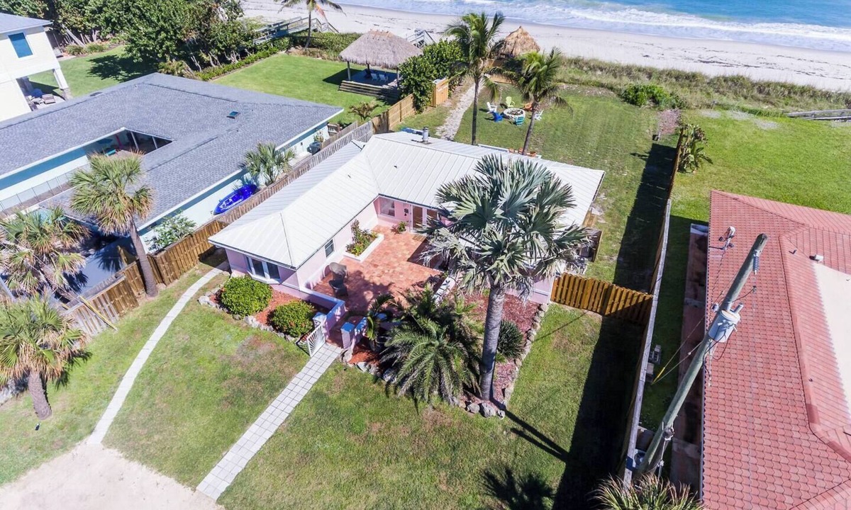 Ocean Shores House | Welcome to “Salty Dog” - named after the old sea captain, this beautiful house directly on the Atlantic Ocean is decorated throughout with a nautical theme. With the breathtaking view of the ocean out your back door you will feel as though you are ac