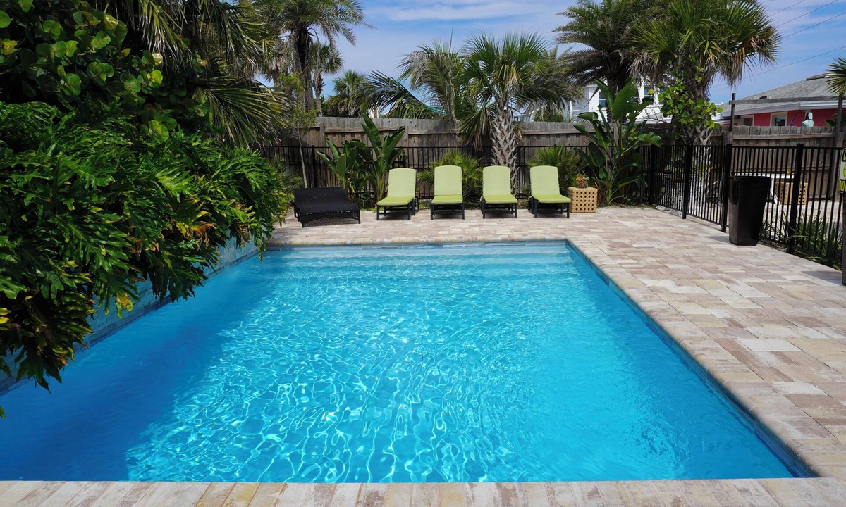 Ocean Cay Apartment | 🌴 Your private island getaway for up to 8 guests 🌴 Perfect for 2 families with separate upstairs & downstairs living 🌴 Heatable tropical pool and outdoor dining 🌴 Walk to 2 restaurants 🌴 2 miles to downtown Fernandina Beach
