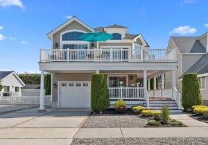 5 bedroom, 4 bath home is just nine houses from the entrance to a dune-protected beach