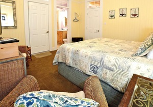 Second-Floor Suite w/ Covered Porches & Full Kitchen - Steps from Dining & Shops