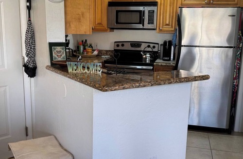 Ocean Side Village Condo | 1-bedroom condo in tranquil Indialantic with pond view, pool and 5 min to beach