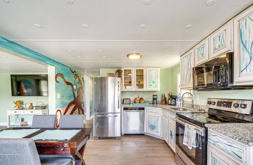 Vista Del Mar House | 1 Mi to Beach: Home w/Dock on Canal in Hudson