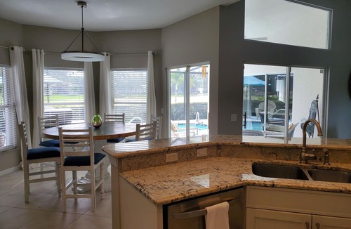 Naples House | 2 Bedroom + Den overlooking the Golf Course with Heated Salt Water Pool