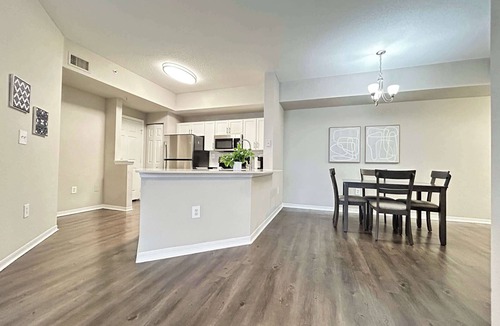 Westchase Apartment | 2 BR with Private Garage, Boutique Shops & Pond Views