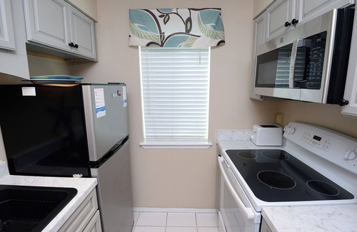Biltmore Beach Condo | 2BR on the beach, beautiful pool, quiet low-rise