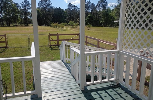 Matthews House | 3-Bedroom 2-bath Home – Covered Porch & Deck, Fenced front Yard, Carport, AC!”