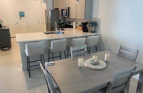 Englewood Condo | 3-bedroom condo in "Beachwalk" Englewood with WiFi, fitness room, AC, & pool.