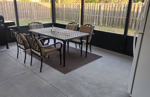 Florida Ridge House | 3-bedroom house in serene Vero Beach with AC comfort. Huge screened in patio