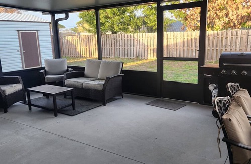 Florida Ridge House | 3-bedroom house in serene Vero Beach with AC comfort. Huge screened in patio