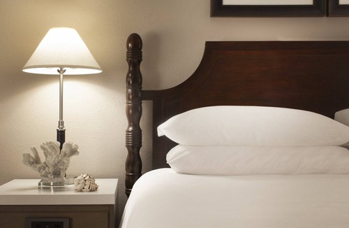 Historic Seaport Hotel | 3 Island-Chic Rooms Offering Private White Sand Beach on Duval St. in Key West