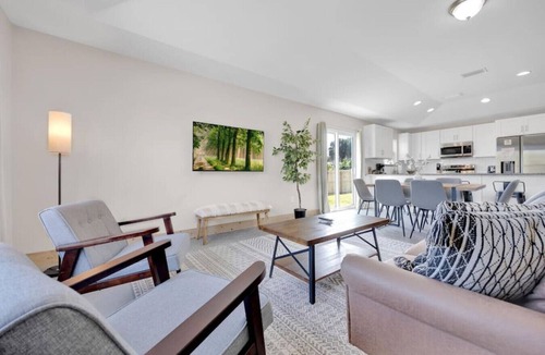 Butler Beach House | 3 minute walk to the beach, outdoor shower, pet friendly, close to downtown