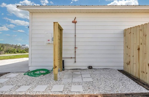 Butler Beach House | 3 minute walk to the beach, outdoor shower, pet friendly, close to downtown