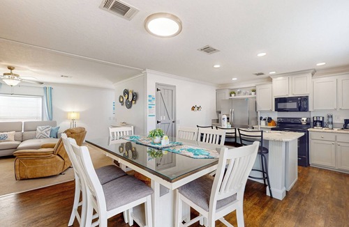 Upper Grand Lagoon Cottage | 3BR Canal-front Home w/Wifi & Boat Dock
