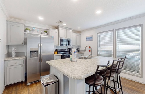 Upper Grand Lagoon Cottage | 3BR Canal-front Home w/Wifi & Boat Dock