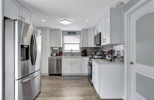 Dunedin House | 3BR Oasis | Sleeps 10 | Heated Pool | Ping Pong!