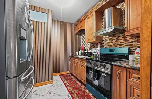 North Valley Stream House | 4-bedroom Entire home in Valley Stream NY, 10 Min to JFK Near Shopping & NYC