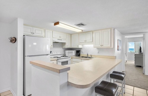 Holiday Isle Condo | 414- Beachfront with Wonderful Gulf Views. Free Beach Service!