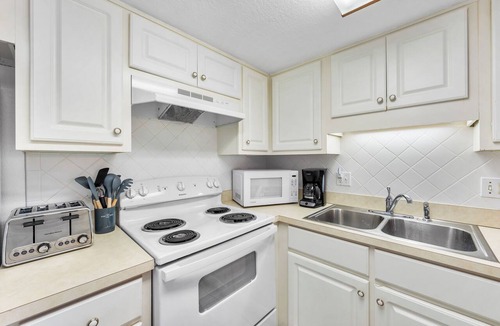 Holiday Isle Condo | 414- Beachfront with Wonderful Gulf Views. Free Beach Service!