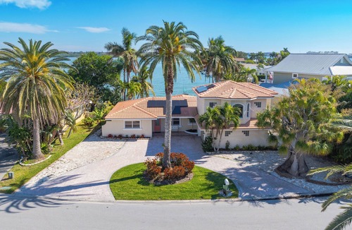 North Redington Beach House | 4bd 2ba Waterfront House with Pool, Hot Tub & Boat!