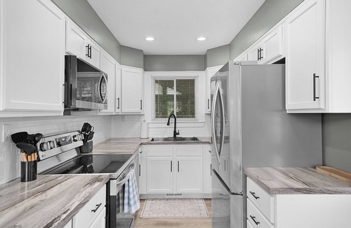 Smyrna Cottage | 4bd 2bth Lakefront Cottage Firepit & Kayaks