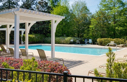 Laurel Grove House | 4BR Beach Cottage w/TWO (2) 6-SEAT GOLF CARTS! Golf Course Views, Pool, Tram