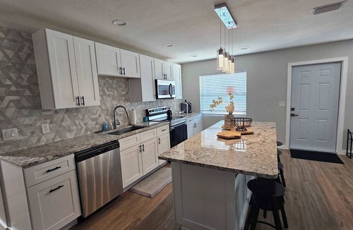 Port Tampa City House | 4BR Port Tampa Retreat | Fenced Yard & Patio