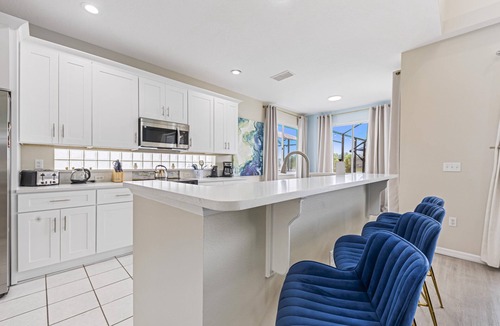 Sunset Lakes House | 5 bed pool home, south facing lake views, 5 mins to Walt Disney World® Resort!