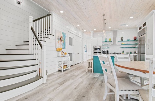 Holiday Isle House | 5 Bedroom Gulf Front Home with Seasonal Beach Service & Bikes | Land Zen