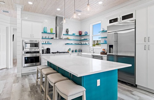 Holiday Isle House | 5 Bedroom Gulf Front Home with Seasonal Beach Service & Bikes | Land Zen