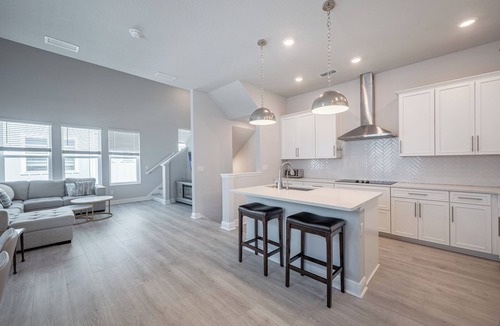 Downtown House | All the Florida fun you can have in this charming 3-bedroom townhome in downtow
