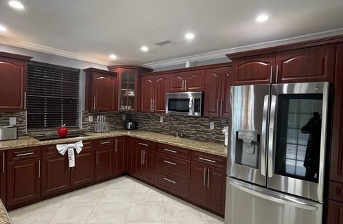 Greenacres House | amazing catch close2airport hot tub full outdoor kitchen