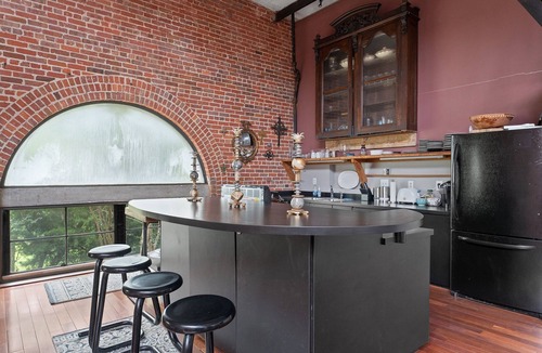 Southeast Pensacola Condo | Amazing Loft in Historic Waterworks Building, near Downtown Pensacola