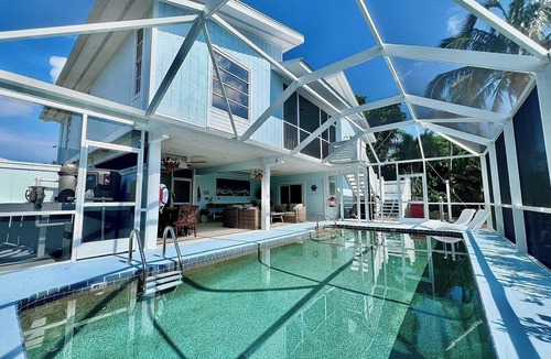 Bokeelia House | Antigua Cay Retreat is a stylish home with pool on deep water canal in Bokeelia