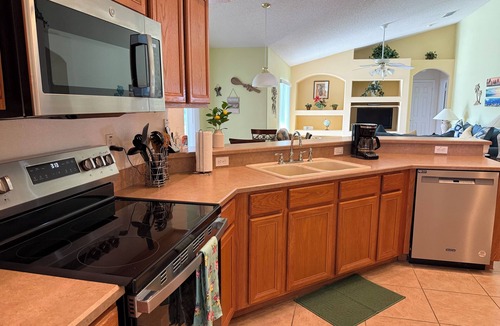 Orange Tree House | Antigua Lake View Villa with Peaceful Pool & Waterfall. Near Disney Free WiFi.