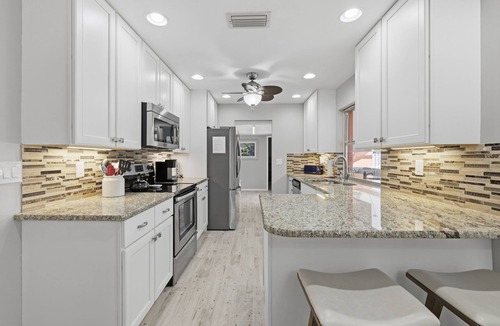 Caloosahatchee House | "AT THE RIVERS EDGE" Spacious 4+bedroom home in beautiful SE Cape Coral