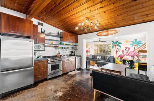 Seacrest House | Atomic Flamingo| Pool w/Slide, Sunken Fire Pit, Bikes & Golf Cart|Pet Friendly