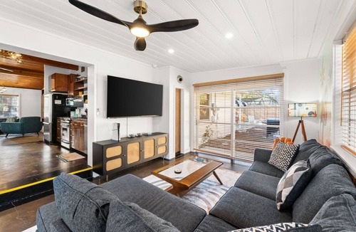 Seacrest House | Atomic Flamingo| Pool w/Slide, Sunken Fire Pit, Bikes & Golf Cart|Pet Friendly
