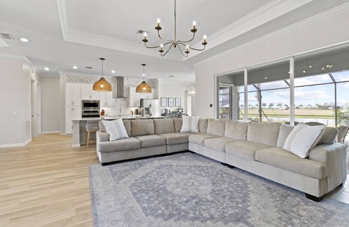 Immokalee House | Ave Maria, The National Golf Course, swimming pool and hot tub.