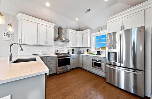 Beach Haven Crest House | Bay and Beach Views Sunsets! Elevator, Heated Saltwater Pool open May 23, 2026.