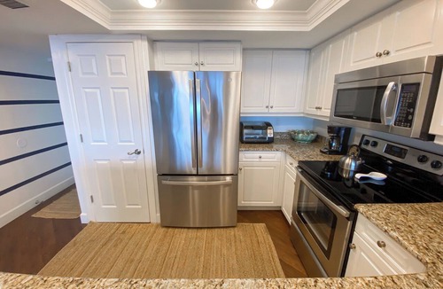 Punta Rassa Condo | Bay View Tower 334: Enjoy fishing by day, and Beachfront views for Sunset