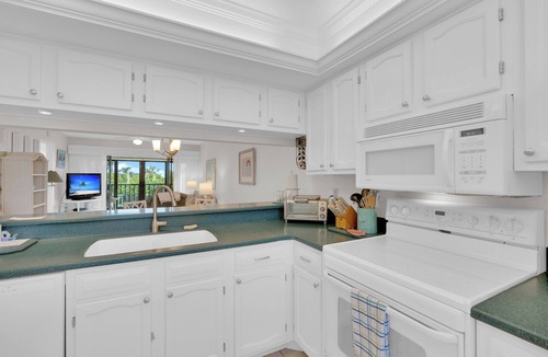 Mid Island Condo | BAY VILLAGE 203 2B/2B CONDO! WALK TO BEACH!
