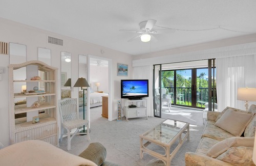 Mid Island Condo | BAY VILLAGE 203 2B/2B CONDO! WALK TO BEACH!