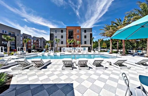 Golden Glades - The Woods Apartment | Beach Bliss Awaits: Cozy 1-Bedroom Retreat, Just Steps from the Shore!"