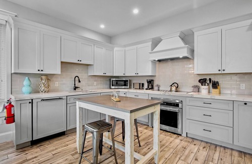 Anna Maria House | Beach Escape! Luxury Home with Pool, Spa, Rooftop Deck and Walk to Beach