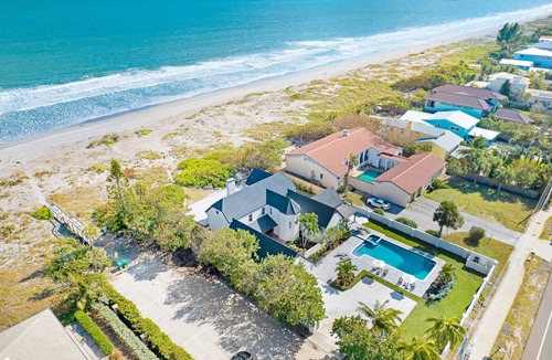 Cocoa Beach House | Beach Front Home with Gated entry Large sparkling pool and private beach access