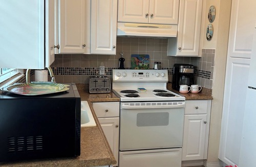 Daytona Beach Shores House | BEACH LIFE! 2 BR 1 BA HOUSE. PARKING/GARAGE. Steps to the BEACH! PET FRIENDLY!