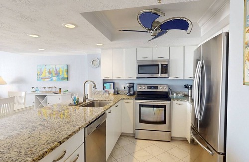 Madeira Beach Condo | Beachfront 2BR with Huge Private Balcony, Pool & Hot Tub & Incredible Madeira Beach Sunset.